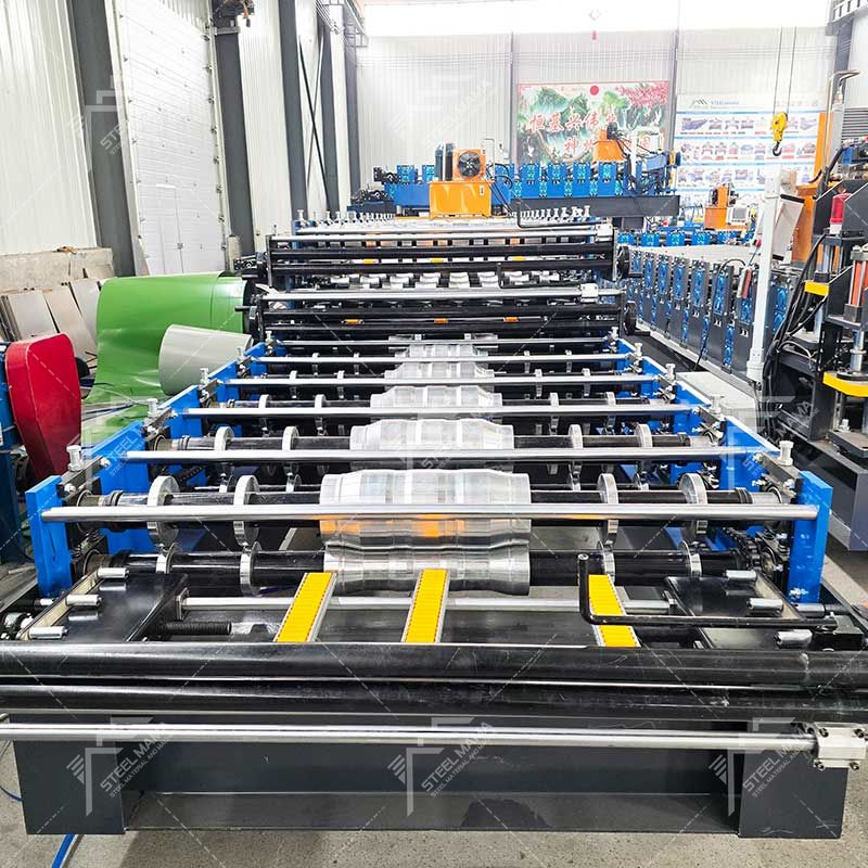 Máquina formadora de rollos de láminas de techo de tres capas de alto rendimiento de producción profesional Steelmama para Colombia
